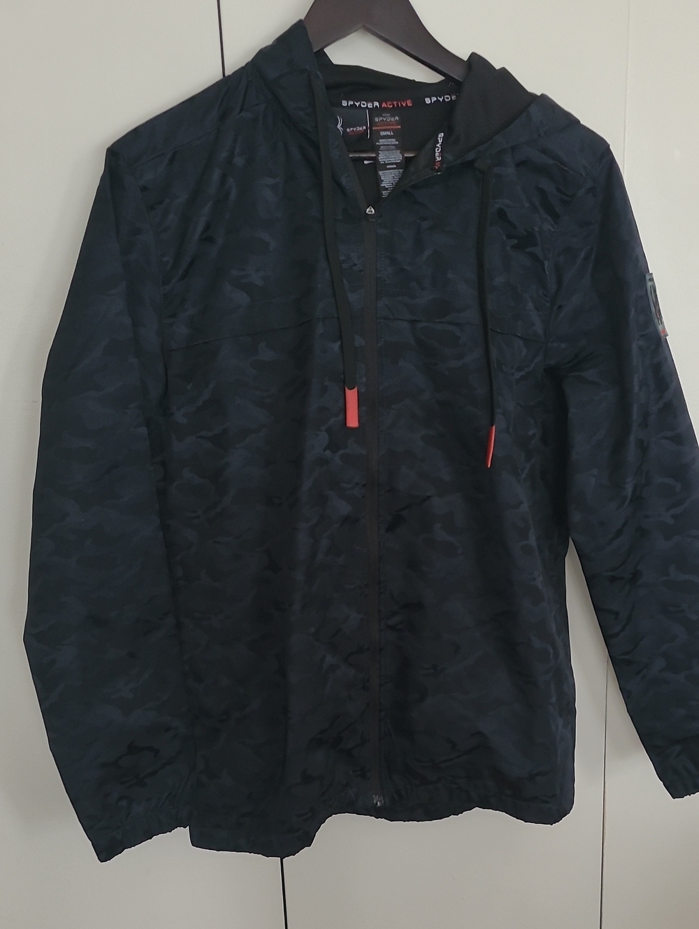 Spyder Men’s Black Camo Hooded Windbreaker with Red Drawcord Tips